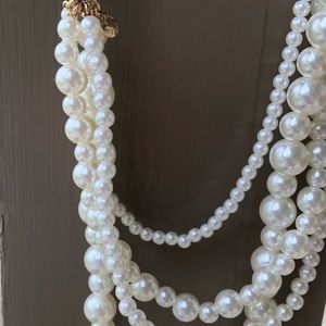 Adjustable pearl multi strand necklace